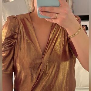 Fun gold and pink body suit! Size small.